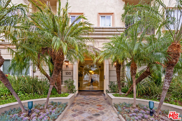 Tucked away in a delightful neighborhood in the heart of Beverly Hills lies this 4 bedroom, 3 bathroom, rarely available condominium. Welcoming arched entrances and curved balconies evoke a dreamy Tuscan villa. Step into this light-infused home with high ceilings and spacious rooms featuring a luxurious primary with fireplace and master bath with spa tub and separate steam shower. The kitchen features stainless steel appliances with an island and additional sink. Crown moldings and two stone masonry fireplaces stand out in the primary and ample living room. The roof-top terrace provides private and decadent lounging in the California sun with exquisite views of Beverly Hills. Amenities include controlled access, concierge, security, rooftop deck, vast storage and secure parking. Located close to Century City, Westwood, and West Hollywood. Only blocks from award-winning dining and world-class shopping.
