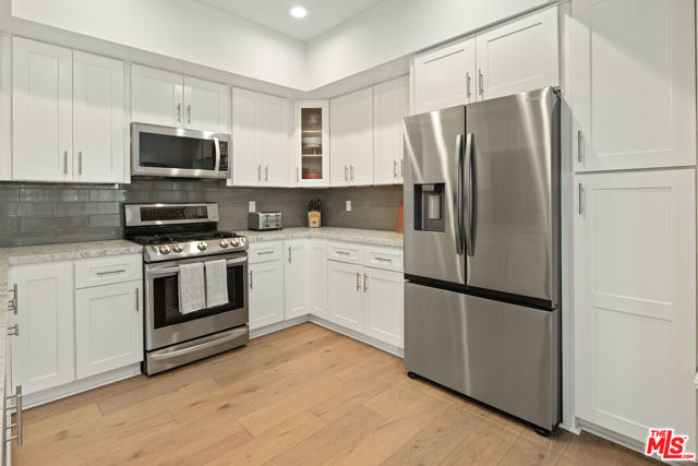 2219 S Bentley Avenue, Los Angeles CA: https://media.crmls.org/mediaz/1976ccd8-4591-474d-8595-c595464994fe.jpg