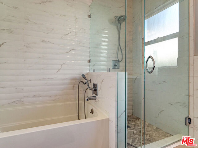 1019 S Rimpau Boulevard, Los Angeles CA: https://media.crmls.org/mediaz/1979071b-abef-40c8-a884-9f47fe7a7102.jpg