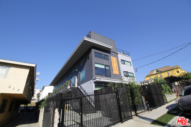 321 N Bixel Street Los Angeles, California Bixel Lofts is a luxury, brand new construction, 9 unit complex located in prime South Echo Park / Westlake / City West near booming Downtown LA. Situated just south of Temple St and the 101 Freeway, this 2020 constructed building has truly unique units that offer renters luxurious, private indoor and outdoor space, usually reserved for homeowners. The property boasts seven townhome-style lofts with private rooftop decks and two ground floor studios, each with a private courtyard. The densely populated location ensures expeditious future lease up and condo-spec luxury build allow for tenant comfort and investor stability. Seven of the nine units have been leased during the Covid-19 pandemic, assuring a future investor the stability in the leasing of these units even during these uncertain times. Uniquely perched on Bixel St, the units have panoramic views of the sparkling Downtown LA skyline.