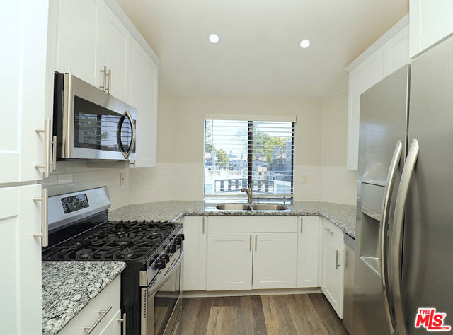 7306 Quill Drive, Downey CA: https://media.crmls.org/mediaz/19cad618-9d1c-415f-817a-b1cd98ca8784.jpg