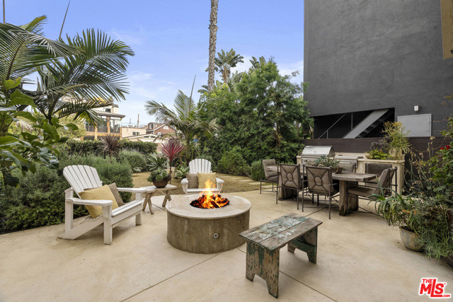 2310 Strongs Drive Venice, California LEED certified modern Mediterranean w/one of the biggest backyards on the Canals. Spectacular outdoor spaces w/rare 35ft deep canal frontage & over 800sf of roof-top entertaining decks w/stone floors, outdoor shower & fire-pits, a hot tub spa & 360 degree views. The living room & kitchen open to the large canal level grass yard w/drought tolerant landscaping, built-in bbq & your own boat dock. Experience 3 floors of polished concrete & wood floors, high ceilings, electric shades, water filtration system, surround sound, security camera system & a versatile floor plan w/custom high end finishes. Main suite w/soaring ceilings, walk-in closet & spa like bath w/deck overlooking the backyard & canals. A 2 car garage + 2 additional parking spaces. Excellent location just one block from the beach w/close proximity to Abbot Kinney, Main St & Washington Blvd w/extremely easy access in and out of the Canals.