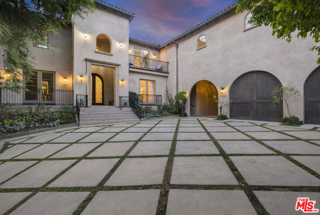 3039 Roscomare Road Los Angeles, California Inside Bel Air Gate North sits this private, quiet, gated and secured Mediterranean estate in pristine condition with little wear and tear on one-half Acre lot, perfect for entertaining and high-end living. 2-story entry foyer, high ceilings throughout, 6 bedrooms, 8 baths, large spacious gourmet kitchen with top of the line appliances, large island, breakfast bar, separate breakfast area, and large family room all open to large-covered patio space for dining alfresco, luscious green lawns, pool and spa. Formal dining and living rooms, library/office/study, wine cellar, grand spiral staircase leads to the generous second floor sitting area which serves as secondary family room, 5 fireplaces, Master Suite with large bath retreat, spacious his and her closets, gym, large private balcony, large motor court, 3 garages with high ceilings, service entrance, centrally located to both westside and valley amenities.
