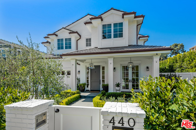 440 25th Street Santa Monica, California This stunning west-facing home has hardwood floors, high ceilings and timeless, detailed finishes throughout. Main level includes formal living room and built-in bar, office, formal dining room with butler's pantry and gourmet chef's kitchen with breakfast area. The sun-filled kitchen and family room with oversized pocket sliding doors open to a beautiful terrace with fireplace and private yard with pool. Upstairs is a luxurious master suite & three guest bedrooms with their own en-suite bathrooms. Lower level features spacious family room with gym/screening room, guest bedroom and arts & crafts room. North of Montana neighborhood and walking distance to Brentwood Country Mart. Perfect entertainer's home.
