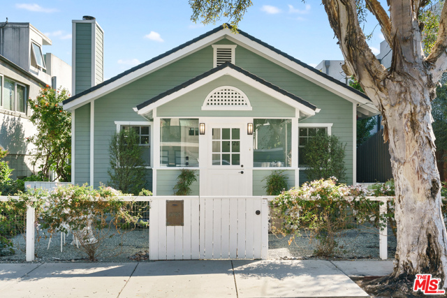 2726 6Th Street Santa Monica, California Charming Craftsman Cottage on the outside and luxurious contemporary masterpiece on the inside. All in the heart of Ocean Park, just blocks from the beach, great schools, parks, shopping and restaurants. This unique property blends Santa Monica history with every modern touch you would desire. The three BRs and laundry are on the garden level. Master bedroom has a big walk in closet, luxury master bathroom with a steam shower, marble countertops, stone tiles and heated floors. MBR opens to a backyard retreat with fire pit area, water feature and lush landscaping plus bonus play structure. On the main level, the kitchen with its greenhouse window & skylight is flooded with light and greenery and has brand new waterfall quartz countertops and plenty of storage. Open living and dining area leads to an exquisite outdoor patio perfect to entertain or watch the sunset. Bright spacious family room. Owned solar panels, AC, storage room, hardwood floors throughout. Many more features and upgrades to see. This gem will not last long - call for an appointment today!