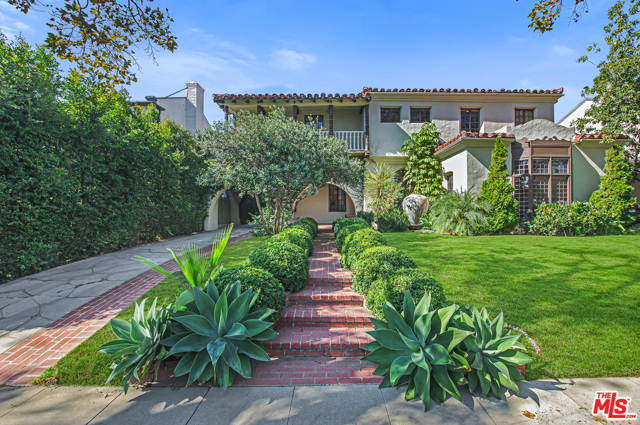 215 S Bedford Drive Beverly Hills, California Rare opportunity to have an elegant yet comfortable fully-furnished home in the flats of Beverly Hills. Walk less than 2 blocks to restaurants and elite shopping and a few steps more to the world famous Rodeo Dr. Perfect for an international business person or family. Clean and simple, this ivy-covered home welcomes you with high ceilings and an abundance of natural light. Open floor plan includes spacious living room, formal dining room with exposed beams overlooking the lush gardens, and family room off the luxury modern kitchen-- complete with stainless steel appliances. Also on this floor is a guest/staff bedroom with modern bath, elegant powder room, laundry room and big grassy yard with outdoor dining area- ideal for entertaining. Upstairs, master suite with large his/her walk-in closets and spectacular bathroom with his/her sinks, steam shower, and bathtub overlooking partial city views and gardens. Brand new pool/jacuzzi has been added to the back yard!!!!!