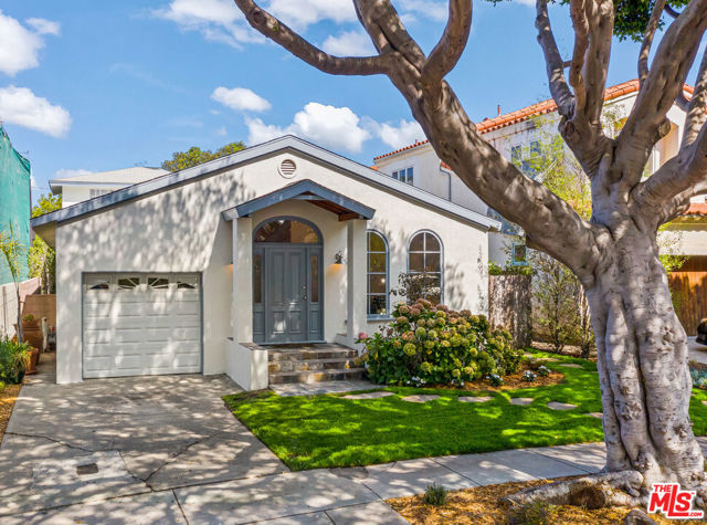 2519 32nd Street Santa Monica, California Located mid-block, on a quiet, treelined street in prime Sunset Park. This 2-story home offers an expanded floorplan with flexibility and utility rarely available in this price range, including 4 bedrooms, 3.5 bathrooms, plus a variety of public and private spaces to entertain, relax, study/work or play. Downstairs, enter a spacious living room with high vaulted ceilings, adjacent powder room, large formal dining room, cooks kitchen with stainless steel appliances and stone counters, 2 bedrooms, 2 guest baths, separate office/den/playroom (potential 5th bedroom), and at the rear of the home, a generous step-down family room opening to a wonderful yard, fully landscaped with grass, trees and patio space. Upstairs offers a primary bedroom suite with walk-in closet, crisp white bath with separate tub and shower, and a fourth bedroom/office/sitting room. Refinished hardwood floors, new carpet, new lighting, new landscaping and freshly painted inside and out. A hard-to-find package, located in the coveted Grant School district, and just blocks from parks, shops, restaurants, and cafes. An unbeatable value!