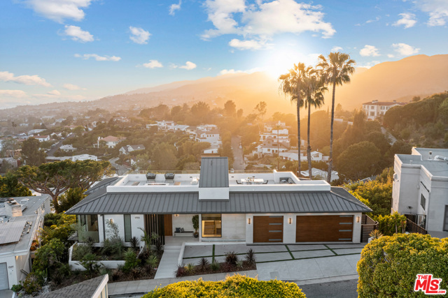 1355 Berea Place Pacific Palisades, California This contemporary home has breathtaking sweeping views from the ocean to the city. Each and every detail was considered in this new build in its prestigious ocean-side neighborhood. High ceilings, open floor plan, and sliding Fleetwood glass doors are just some of the stunning details that complete this home. Light shines through perfectly making happy and bright living spaces and bedrooms. The 7,800 sq/ft spacious home has six en-suite bedrooms and eight bathrooms, perfect to host guests. The main suite has a fireplace and balcony, a perfect retreat to sit back and relax. Enjoy the luxurious amenities of the theater, rooftop deck, 3 car garage, and elevator. The private pool, spa, and built-in BBQ, wine cellar and full onyx bar make this home a destination for entertaining friends and family. Dont miss your opportunity to own this incredible home.