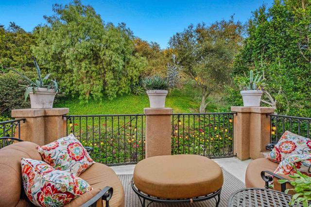 Private deck/balcony off the Primary Bedroom.  So quiet you can literally hear a pin drop in this neighborhood!