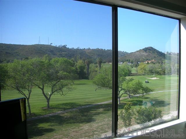 View from the Large Picture window in the living room which faces west overlooking the Admiral Baker Golf Course