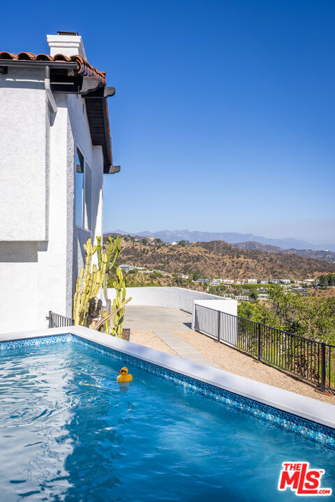 8300 Grand View Drive, Los Angeles CA: https://media.crmls.org/mediaz/1b5b9608-f9e6-4cec-93e6-ea00ffa6f337.jpg