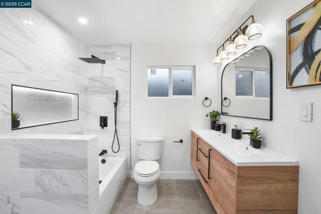 1348 E 26Th St, Oakland CA: https://media.crmls.org/mediaz/1b6097b8-66e6-4b25-b572-6753305fb3a6.jpg