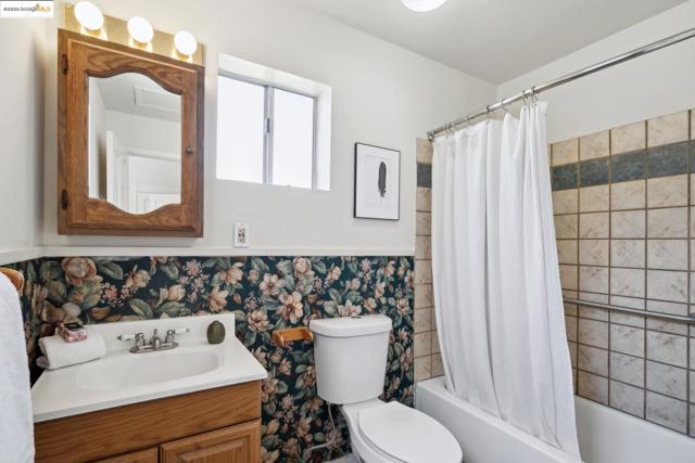 1408 E 15Th St, Oakland CA: https://media.crmls.org/mediaz/1b9373c5-90a1-4dce-a4e8-f403e65954a2.jpg