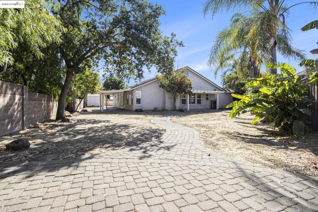 View of the back of the house and possibilities for a pool, ADU or Oasis.