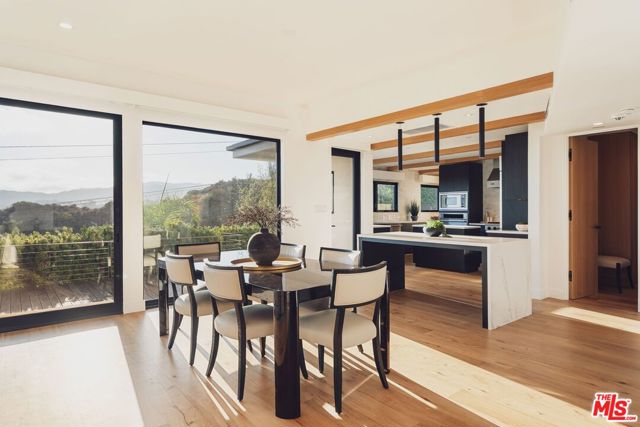 Drew Fenton | 1235 N Kenter Avenue Los Angeles CA | MLS: 7439365