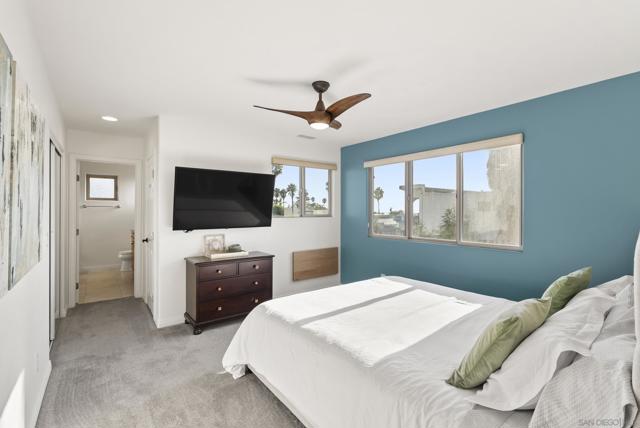 Windows open to shifting blue horizons and the coastal soundscape.