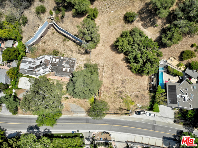 Incredible opportunity to develop for resale or build your dream home on this stunning 0.69 Acre lot in a highly desirable Beverly Hills location. Next door lot at 2526 Benedict Canyon Drive is available too. This can be a rare double lot project with over 55,000 SF combined. Two separate APN's allow for either two homes or one large estate if purchased together. The property located in the heart of Beverly Hills within minutes from Rodeo Drive and the Beverly Hills Hotel.