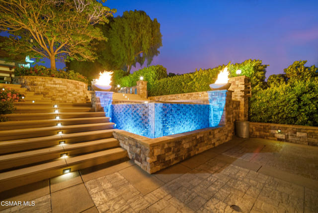 Hot tub with waterfall