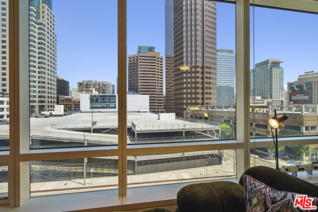 Large Floor to Ceiling Windows Showcase Cityscape Views