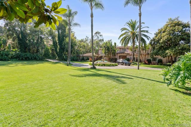 Expansive front yard is perfect for valet on your largest events.