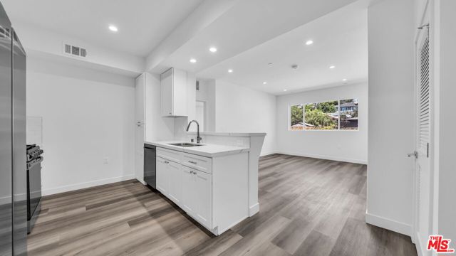 627 N Dillon Street, Los Angeles CA: https://media.crmls.org/mediaz/1f87d9e0-de95-4d9b-a08b-7f48f87384d2.jpg