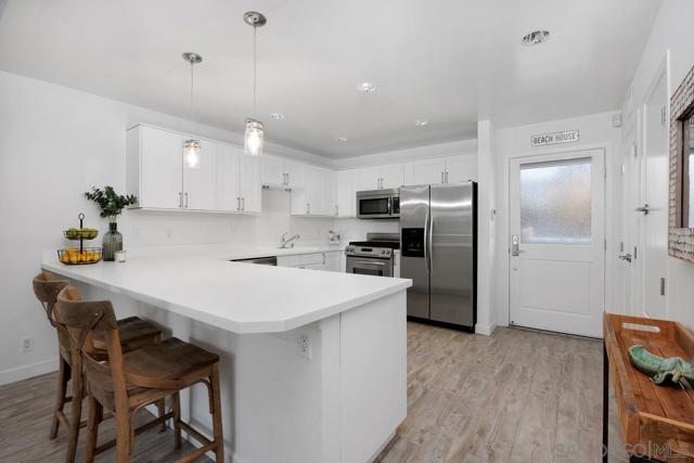 317 Pine Ave, Carlsbad CA: https://media.crmls.org/mediaz/1fa0dc69-f383-4bf7-9183-c206c0dc82b6.jpg
