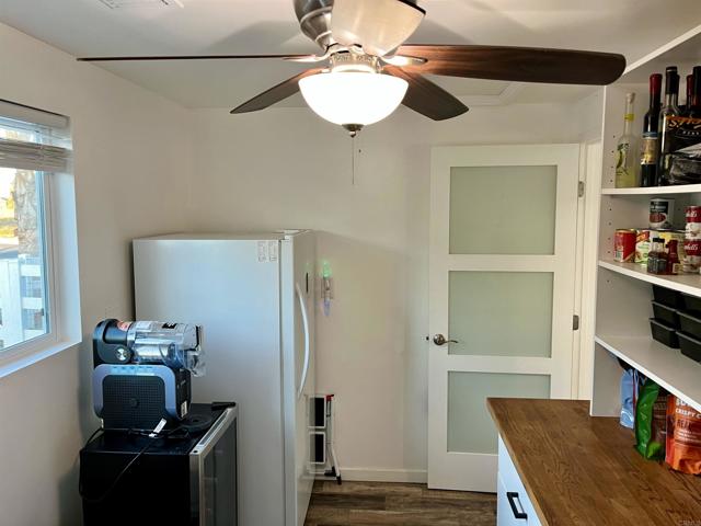 3rd bedroom currently being used a pantry. Shelving is on finished floor and can easily be removed.