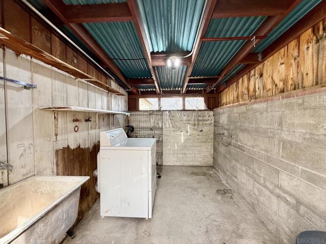 Outdoor shed with laundry hookups