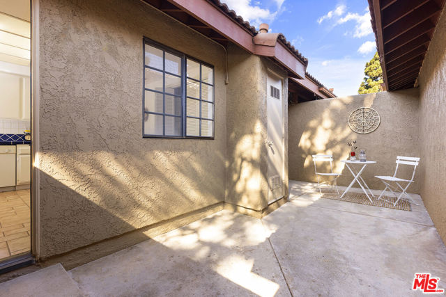 Spacious Outdoor Patio between House / Garage