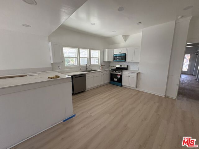 2320 W 25th Street, Los Angeles CA: https://media.crmls.org/mediaz/2020161c-ec94-4d3f-ae04-7b4ce53d874c.jpg
