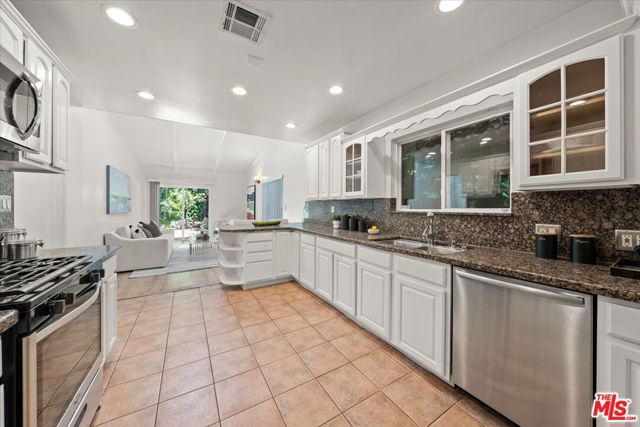 1220 N Norman Place, Los Angeles CA: https://media.crmls.org/mediaz/203008bb-f077-42aa-b69e-f6833f880d6d.jpg