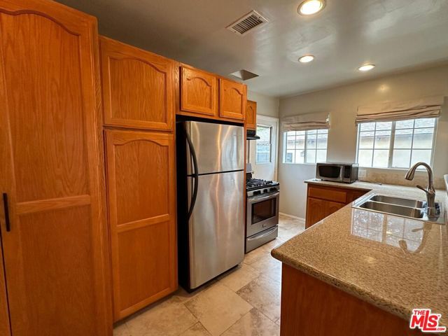 5656 Airdrome Street, Los Angeles CA: https://media.crmls.org/mediaz/2069a280-bb4c-46cb-8162-bb01d636d5e4.jpg