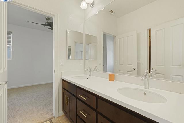 1025 S Fowler Ln, Mountain House CA: https://media.crmls.org/mediaz/20be2ca1-03a8-4761-a849-e998d53a0259.jpg