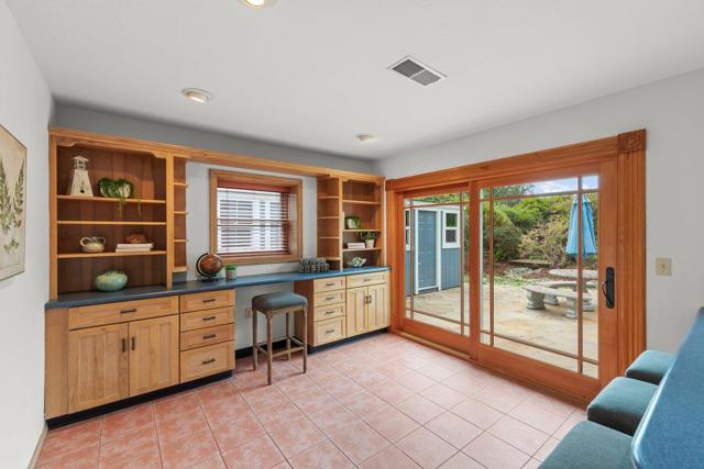 Beautiful built-ins and rear yard access.