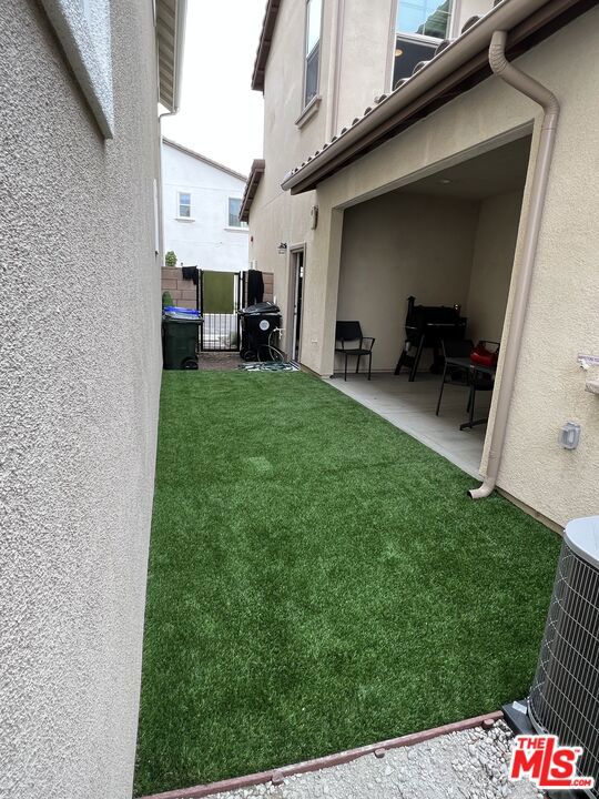 Side Yard & Outside Room