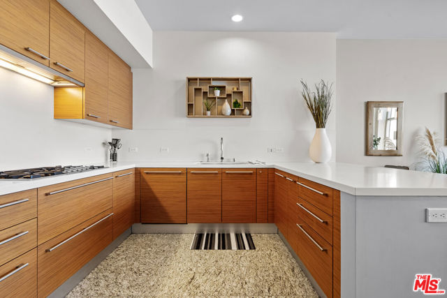 900 W Olympic Boulevard, Los Angeles CA: https://media.crmls.org/mediaz/21a9a93d-30b4-486e-8744-8e5493315725.jpg