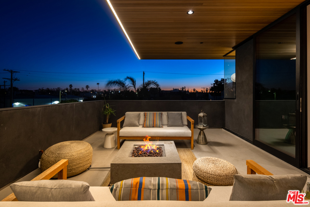 303 Windward Avenue Venice, California One of a kind custom architectural masterpiece with the beach in your backyard! Step into this soulful home with its own legal 2nd unit/studio! Designed by Robert Thibodeau, this home was completed with the utmost attention to detail. Indulge in every detail as you enter into the main level with soaring windows running the length of the second story, a fabulous chef's kitchen, and meticulously crafted hardware and lighting. You will find admiration in the soaring cedar ceilings, Ann Sacks tile-work, the solid oak herringbone hardwood floors, and Portola Roman Clay Gypsum walls that guide you to the second story while taking in all the artistic details. Upstairs you will be drawn to two spacious bedrooms and a loft/den perfect for your home office! An expansive, luxurious master retreat that encompasses the entire third floor with a cedar sauna and deck with views. Spacious and perfectly finished ADU for guests or to rent! A large 2 car garage and exterior spaces offer ample parking. Seconds to the beach and just off Abbot Kinney, you are in the heart of Venice, there is nothing else like this!