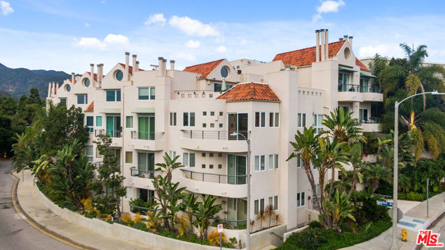 15425 Antioch Street 103 Pacific Palisades, California Welcome to coastal living at its finest! Nestled in the heart of the prestigious Pacific Palisades, this immaculate 1st floor condo features an open floor plan and plenty of natural light to create a bright and airy space that is perfect for entertaining. The gourmet kitchen is equipped with quartz countertops and custom paneled appliances to match the chic minimalist cabinets. Moving on to the stunning master suite, enjoy a large walk-in closet with built-in cabinetry and an en-suite bathroom, complete with a floating dual sink and spacious walk-in shower. As an added bonus, the master suite offers a sunken living space, ideal for a reading nook or comfortable place to relax. The additional bedroom features built-in shelving and could be utilized as an office, guest room, or flex space--the possibilities are endless. Unwind next to the fireplace in the luxurious den or enjoy the peaceful retreat of the enclosed patio made private by fragrant Jasmine vines--this home truly has it all. Safely tucked away in a secure and gated corner building, this ideally located condo is just minutes away from the Pacific Ocean, hiking trails, fine dining, boutique shopping, and top-rated schools such as Palisades Charter Elementary School and Palisades Charter High School (both LAUSD rated 9+). Don't miss the opportunity to make this beautiful Pacific Palisades condo your new home.