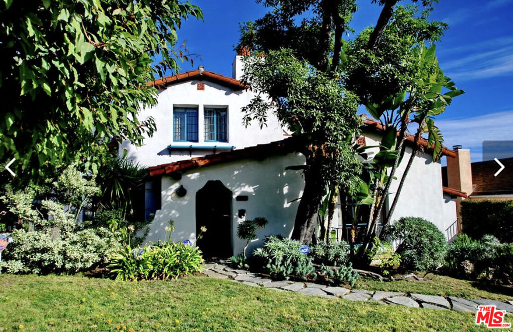 1928 N Western Avenue Los Feliz, California Enjoy this beautiful Spanish revival style home designed by famed Los Feliz architect Harry Hayden Whiteley for director Robert McGowan, who along with producer Hal Roach became famous in the 1920s with the success of the "Our Gang" series. An inviting entrance welcomes you to experience the quality craftsmanship and design throughout. The two story home features a grand scale living room which boasts high ceilings and beautiful architectural wood beams. Decorative wood and authentic details are seen through-out the home including period molding and light fixtures. This home has 5 bedrooms, 4 bathrooms, large dining room space, period kitchen with updated appliances. Spacious basement with wet bar, great for entertaining. Pride of ownership is quite evident in this home. Enjoy the large backyard with fruit trees, built in barbecue and large outdoor covered entertainment area. The outdoor area provides plentiful space for large gatherings and entertaining. Private and gated. This is a piece of history you won't want to miss!