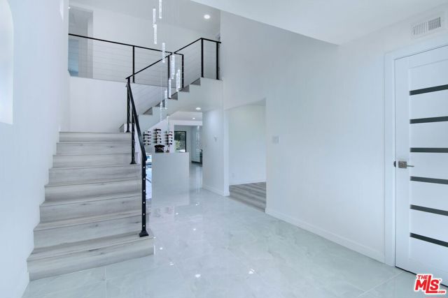 12112 Woodley Avenue, Granada Hills CA: https://media.crmls.org/mediaz/22a2877c-d69d-48fe-a3b7-175a3f573932.jpg