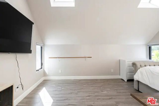 Bedroom #4: There is a single barre, as well as TV and dresser