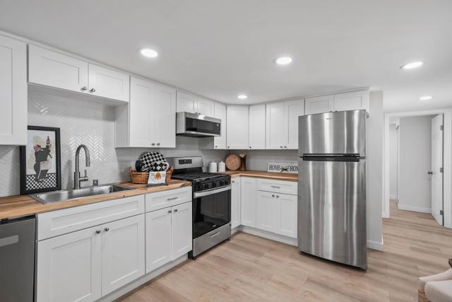 410 S First, El Cajon CA: https://media.crmls.org/mediaz/237fd625-7bdd-4ede-9ea7-05a468a6574d.jpg