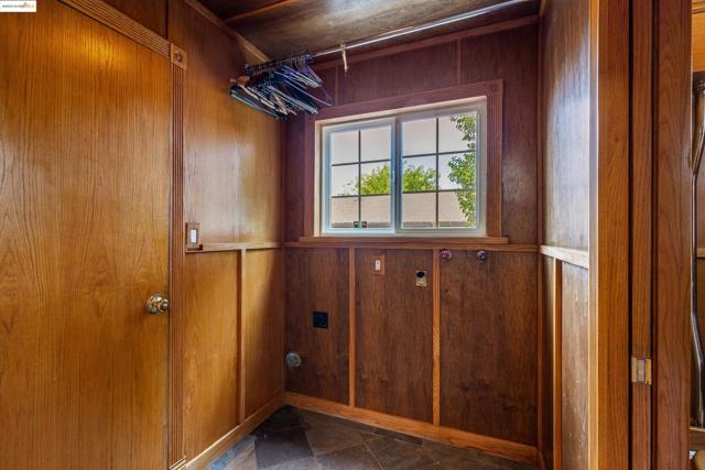 LAUNDRY ROOM NEXT TO GARAGE ENTRY