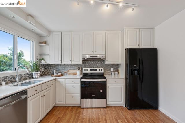 dishwasher, electric stove (solar panels) and french door fridge