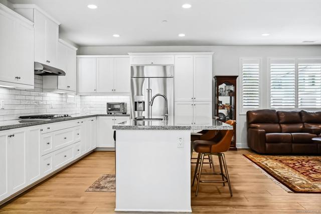 704 Merit Dr, San Marcos CA: https://media.crmls.org/mediaz/24a0a2c1-74aa-4178-a6c1-f920246d9b52.jpg