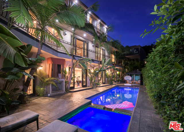 1650 MARLAY Drive Los Angeles, California Lowest price per sf on the Sunset Strip! This Newer built 16,000 SQ FT Sexy Mediterranean Gem overlooking the Sunset Strip & unobstructed downtown LA views has every conceivable amenity one could ask for. Massive 3,000 SQ FT Master Bdrm w/ 3 boutique-size walk in closets, 4 fire places, his & her baths w jet-spa tub & steam shower, private office, private outdr terrace w/ cabana & flat screen. Find an addtl 7 bdrs en suite including 2 more Master suites w head on views & private patios. Impressive 64 ft fully equipped gym, professional movie theater with sofa/stadium seating, huge kitchen w 2 breakfast bars that opens to the family room, formal living room, and 22 seat dining room. Sports bars on most levels w pool table, ping pong & shuffle board for convenient entertaining, professional high speed elevator, SONOS surround sound inside & out, 5 car garage, 24 flat screens, 32 camera surveillance system, outstanding wine room, sauna, grassy pad, 2 steam showers.. the list goes on & on!