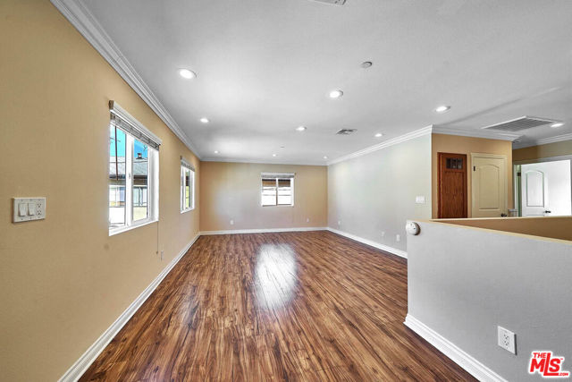 1142 S Mariposa Avenue, Los Angeles CA: https://media.crmls.org/mediaz/2587e4d7-4b0d-43c3-ab99-1d3ae896278b.jpg