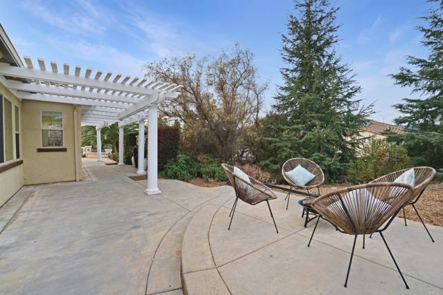 Directly outside of the primary bedroom is this raised patio perfect of outdoor spa.
