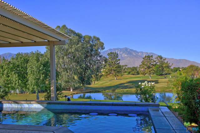 16 Colonial Drive Rancho Mirage, California You can have it all. Spectacular location with elevated fairway, lake and mountain views...it doesn't get any better than this. Wonderful floor plan, fine finishes and tasteful color palette throughout. 3BR's in the main house plus attached spacious casita for a total of 4BR's-perfect for work from home flexibility or extended family/guests. Gorgeous private pool and back patio to take in the amazing views. Guest parking and community pool and spa conveniently located across the street. Private entry courtyard, two car plus golf cart garage, owned solar-this is a true find.