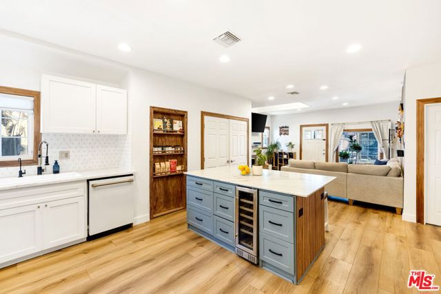 341 E 64th Street, Los Angeles CA: https://media.crmls.org/mediaz/26bbbebe-a4c9-4cb3-a13b-b21e03ff2d45.jpg